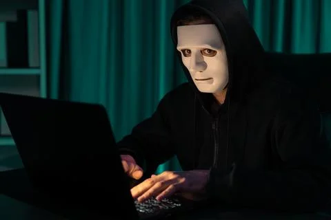 White criminal anonymous mask installing coding password encryption. Pecuniary. Stock Photos