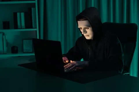 White criminal anonymous mask installing coding password encryption. Pecuniary. 스톡 사진