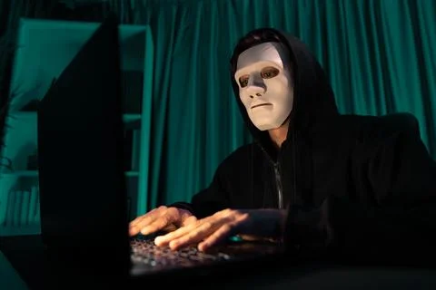 White criminal anonymous mask installing coding password encryption. Pecuniary. 스톡 사진