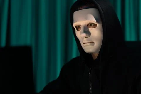 White criminal anonymous mask installing coding password encryption. Pecuniary. 스톡 사진
