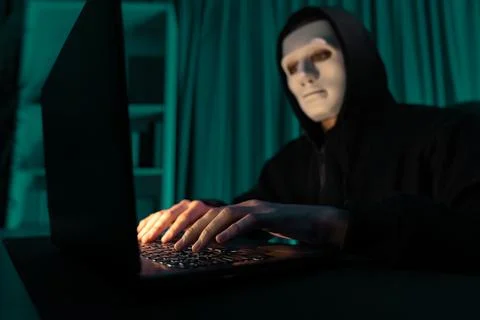 White criminal anonymous mask installing coding password encryption. Pecuniary. Stockfoto's