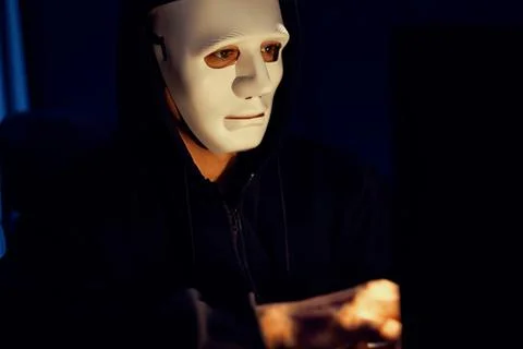 White criminal anonymous mask installing coding password encryption. Pecuniary. 스톡 사진