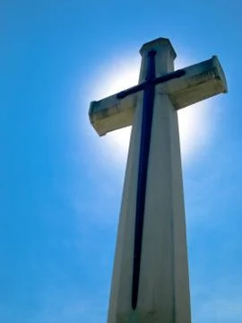 White cross with blue sky Stock Photos