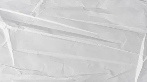 White crumpled paper background, blank wrinkled sheet Stock Footage 346549794