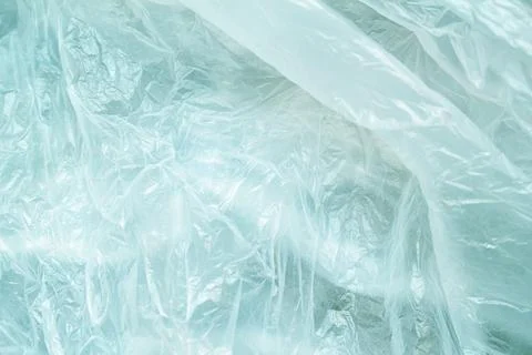 White crumpled plastic background close up polyethylene Stock Photos