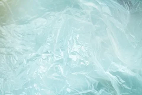 White crumpled plastic background close up polyethylene Stock Photos