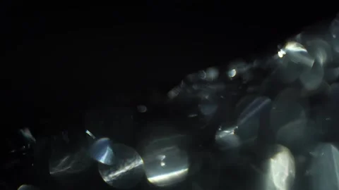 White crystal bokeh with slow motion condensation on the right side of the frame Stock Footage 315314307