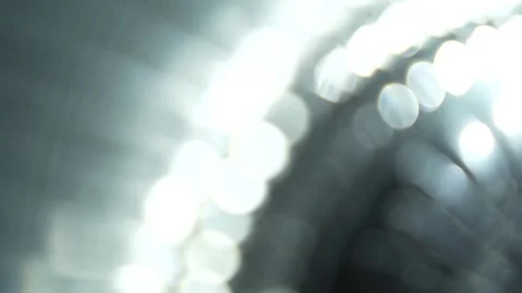 White crystal light in a semicircle shape, one after another, without focus Stock Footage 315319115