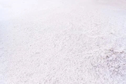 White Crystalline Salt Flat Texture Close-Up with Granular Detail Stock Photos
