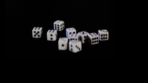 White cubes fall out, fly out on a black background for the game. Bones fall Stock Footage 129870827