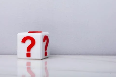 White Cubic Block With Question Mark Sign Stock Photos