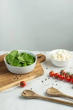White culinary background with ingredients for making salad Stock Photos