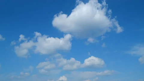 White cumulus and cirrus on different layers cloudscape on beautiful sunny clear Stock Footage 217379952