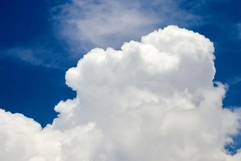 White cumulus cloud on a blue sky background Stock Photos