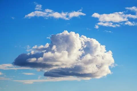 White Cumulus cloud in blue sky Stock Photos