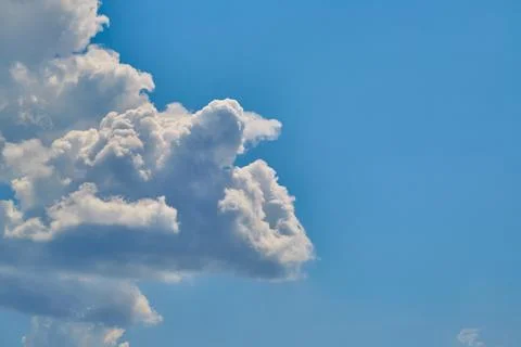 White cumulus cloud close-up, cloud structure in the sky, cloud formation Stock Photos