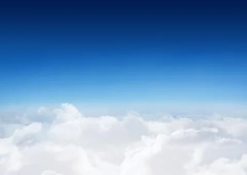White cumulus cloud layer is stretching across smooth flat design sky, with Stock Photos