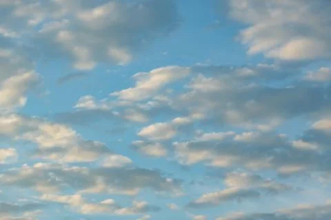 White Cumulus clouds in a blue sky Stock Photos