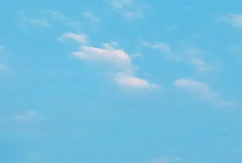 White cumulus clouds blue sky. Stock Photos