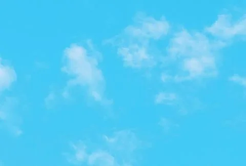 White cumulus clouds blue sky. Stock Photos
