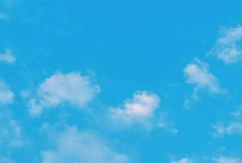 White cumulus clouds blue sky. Stock Photos