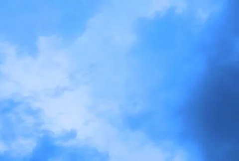 White cumulus clouds blue sky. Stock Photos