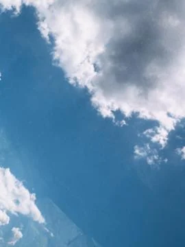 White Cumulus Clouds in Blue Sky Background. 写真素材