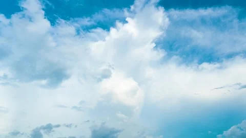 White Cumulus Clouds Drifting Slowly Across A Bright Blue Summer Sky Background Stock Footage 342217997