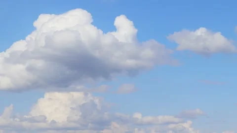 White cumulus clouds Stock Footage 239845519