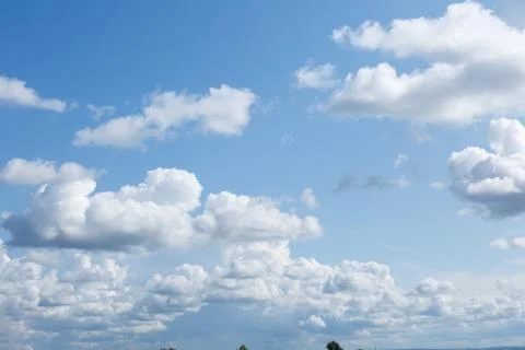 White Cumulus clouds. Stock Photos