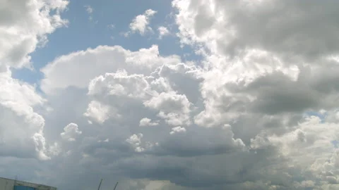 White cumulus clouds turn into black clouds and become rain clouds time lapse. Stock Footage 205879843