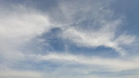 White cumulus or cirrocumulus clouds on beautiful sunny clear sky Stock Footage 147113790