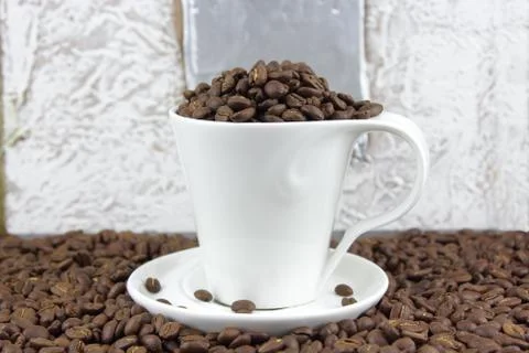 White cup and beans Stock Photos