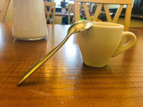 White cup in cafe with vertical cup Stock Photos