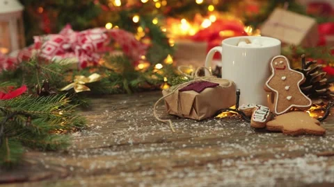 White cup cocoa drink marshmallows gingerbread cookies on wooden table, gift box Stock Footage 166866738