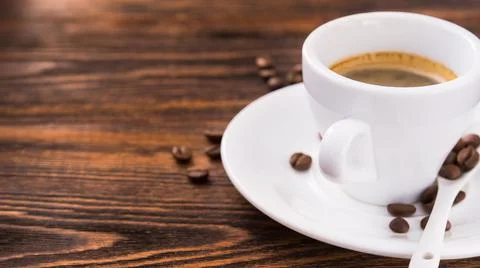 White cup with coffee Stock Photos