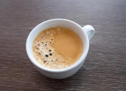 White cup of coffee. Stock Photos