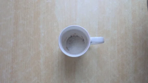 In a white Cup of coffee poured boiling water Video stock 85819928