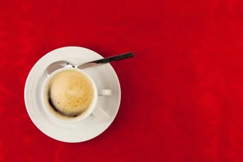 White cup of coffee  on red background Stock Photos