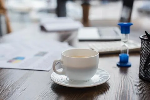 White cup coffee table office Stock Photos