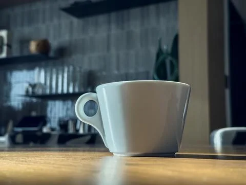 White cup of coffee on the table. 스톡 사진