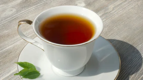 White cup of hot black tea, close up Stock Footage 62528026