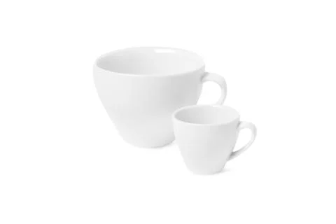 White cup isolated on white background. Ceramic coffee cup or tea mug for drink Stock Photos