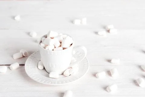 White cup with marshmallows. Stock Photos