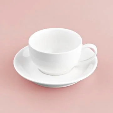 White cup on red background solid Stock Photos
