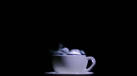 White cup of tea or coffee  with steam on  black background. Stock-Footage 61217103