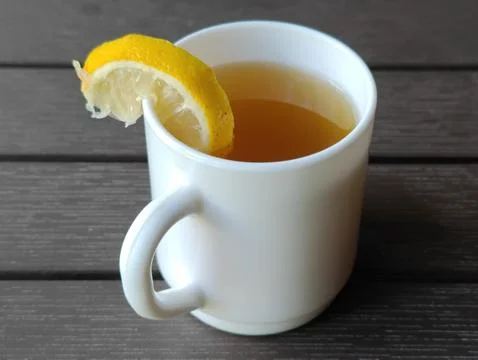 White cup with tea Stock Photos