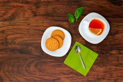 White Cup of tea with a slice of lemon and Dry cracker cookies served with a  Stock Photos