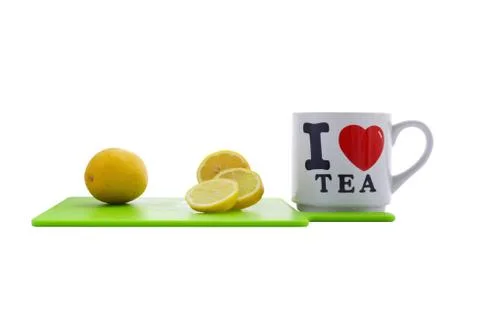 White cup of tea on white background Stock Photos