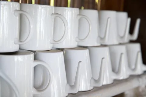White cups stack on shelf Stock Photos